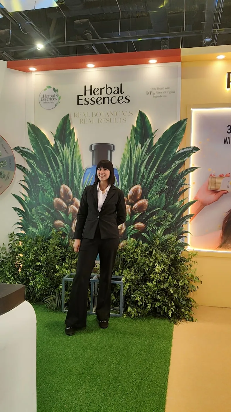 Brand promoter at a haircare exhibition stall